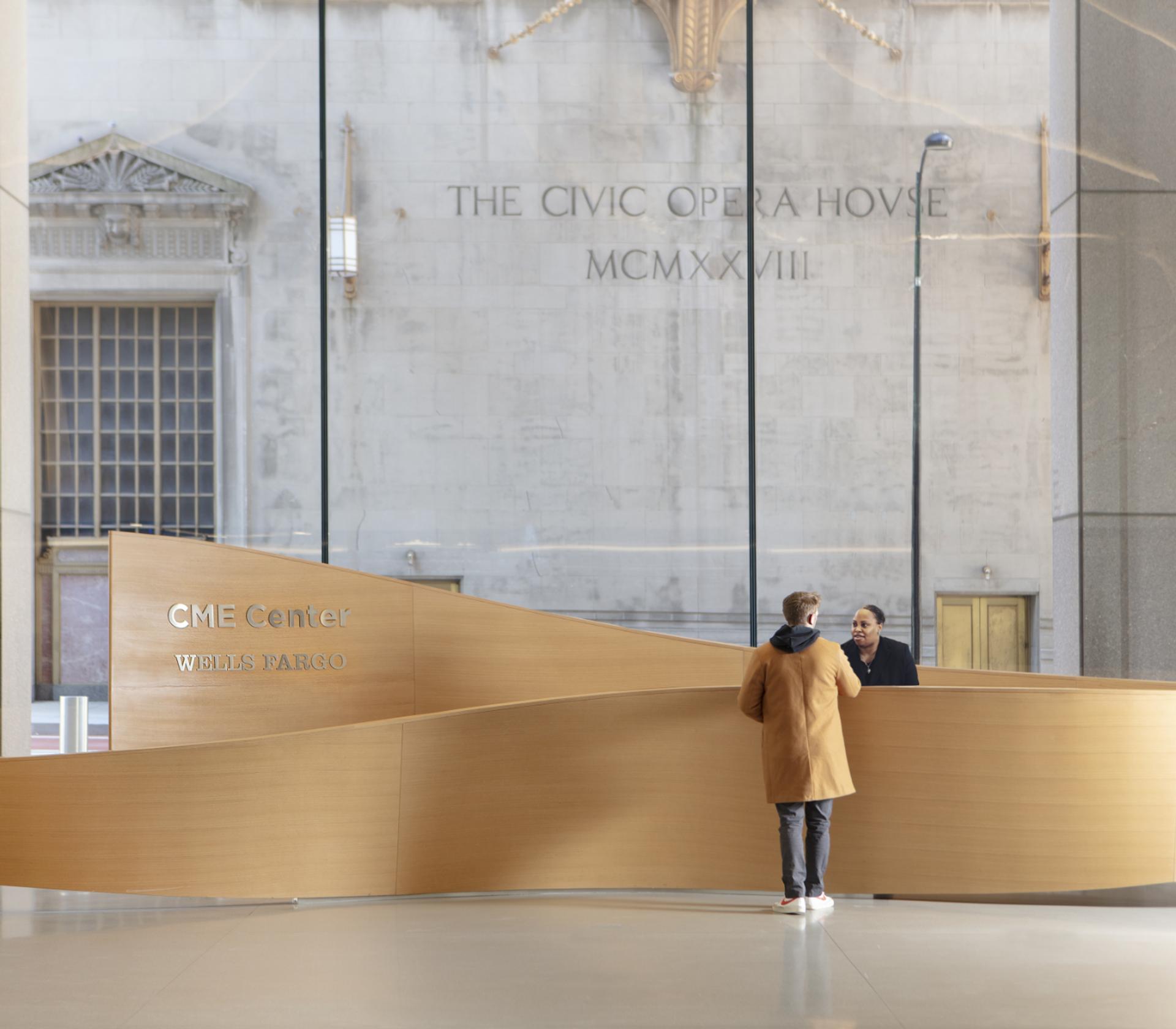 The new CME Center lobby creates a flowing, modern boulevard between its two towers, its concourse, and the river, connecting every entrance to Wacker Drive. Walking through, you don’t just see the city, you feel it.