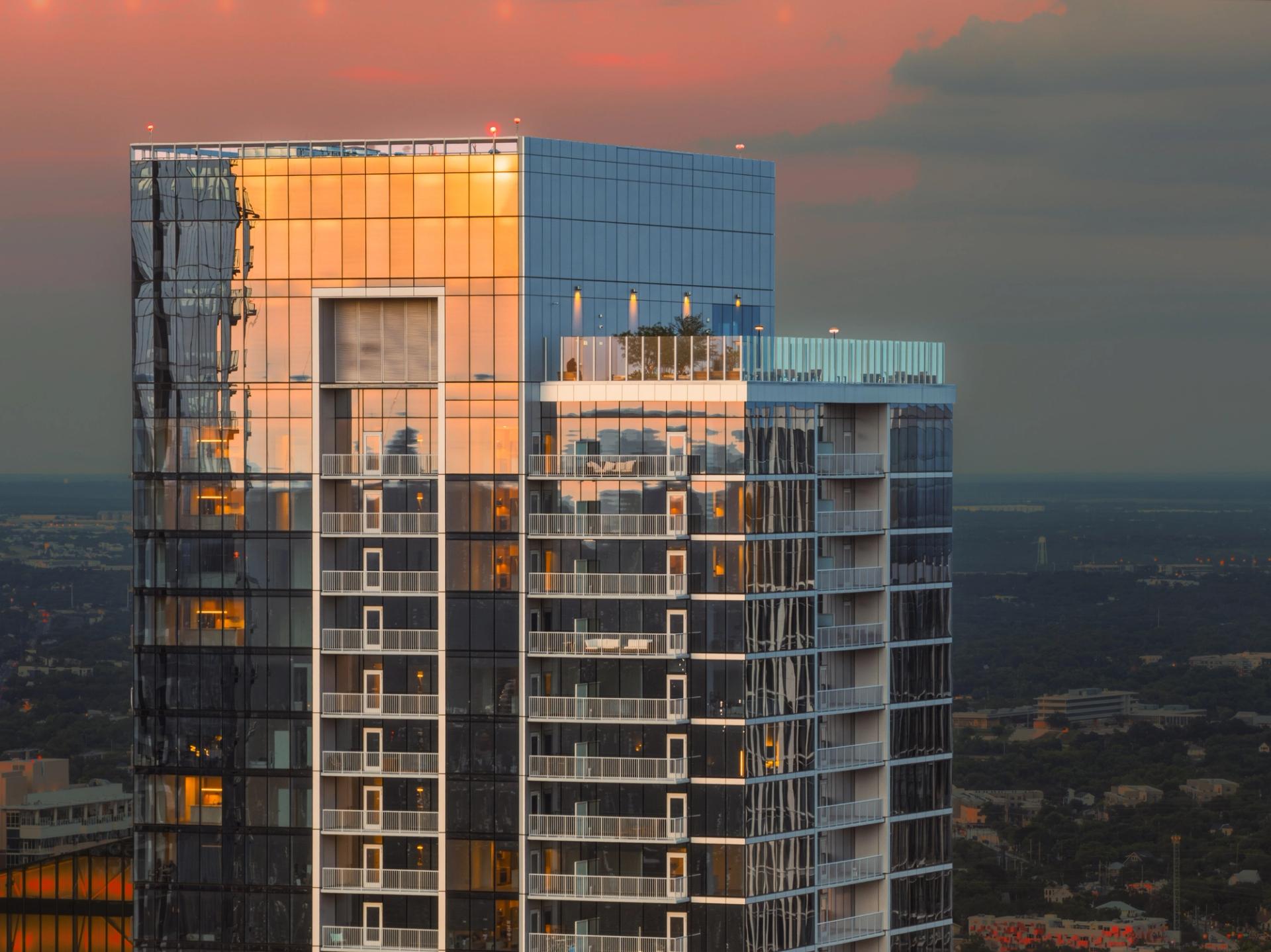 ATX Residences exterior photo showing the outdoor terrace