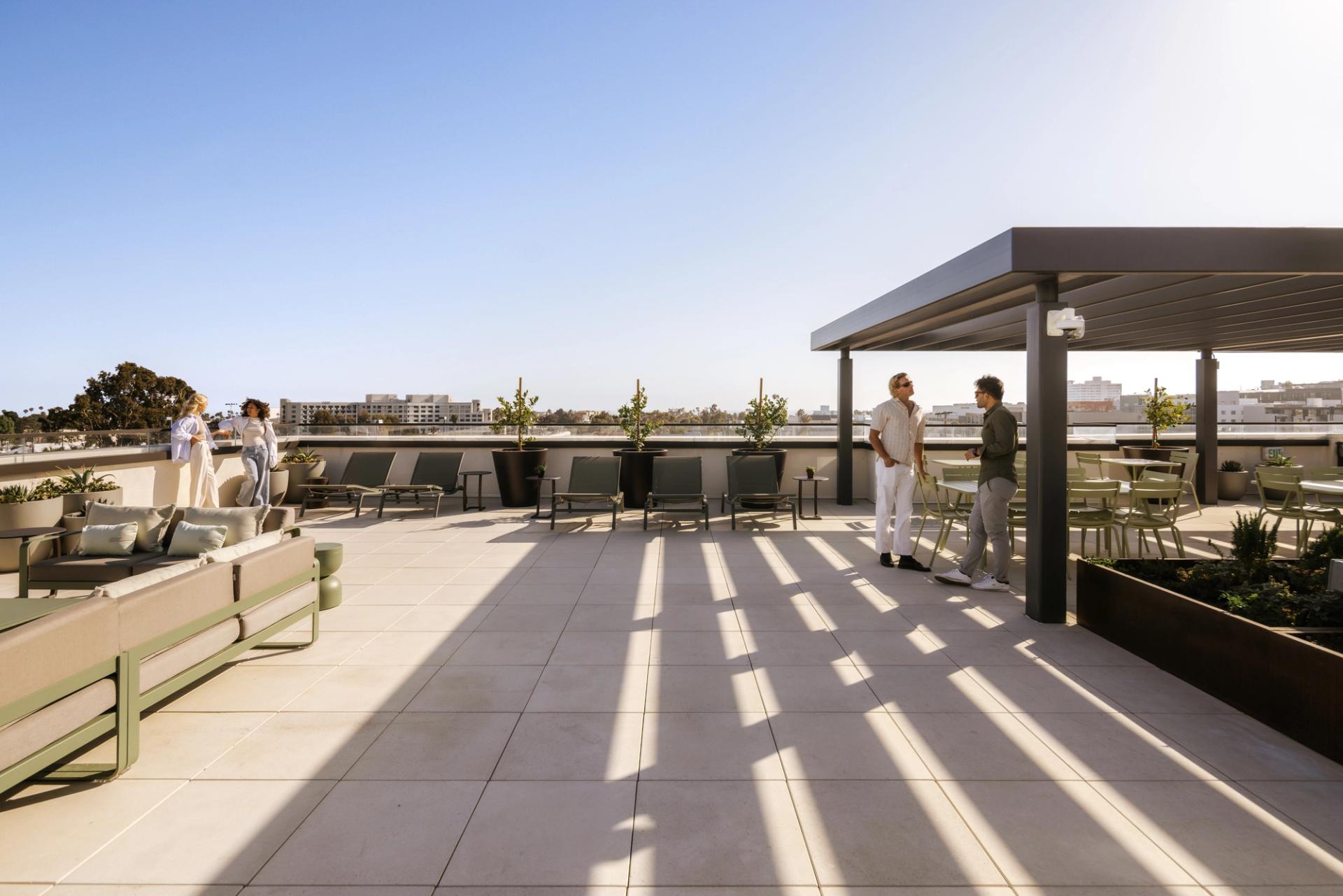1650 Lincoln | Rooftops designed for unwinding, with generous lounge seating set in a soft, green surround