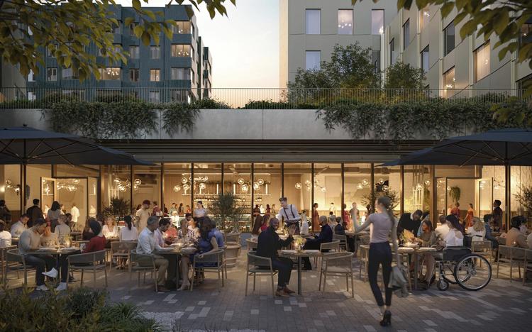 Evening outdoor view of a cafe at Verra