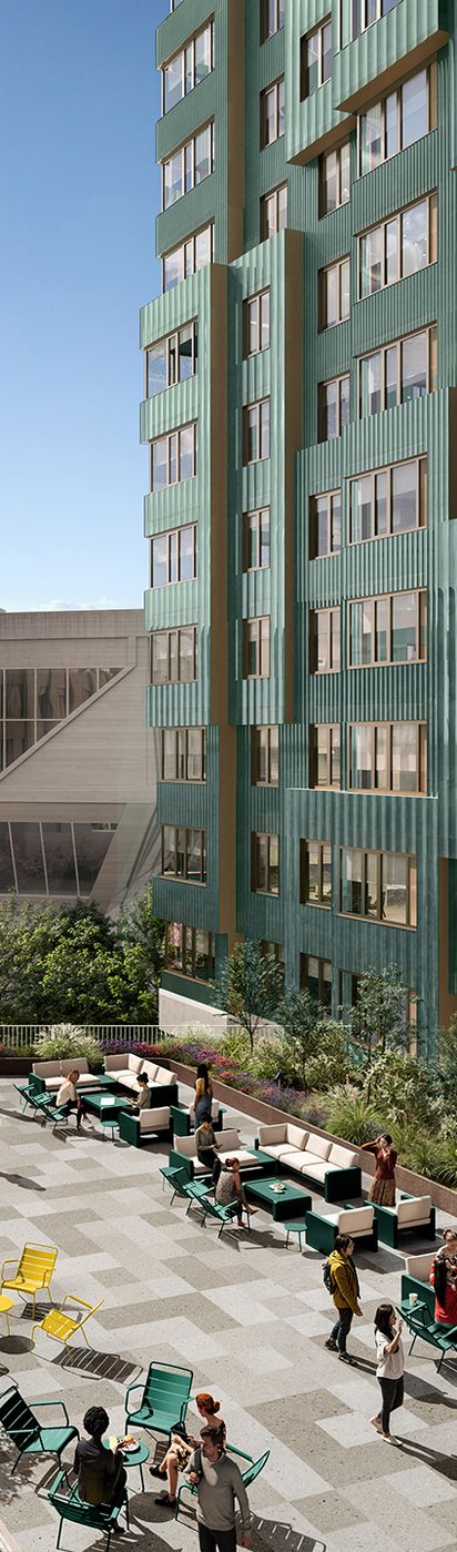 The exterior of Verra Apartments for rent in Boston, MA, featuring a modern facade with large windows.