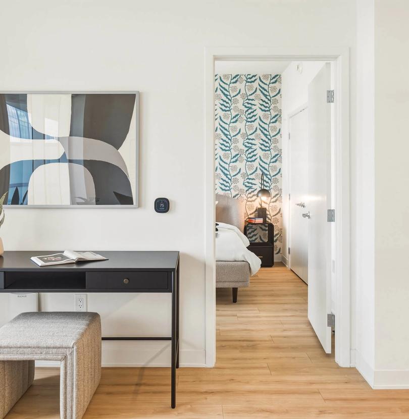 Bedroom with a balcony and a view