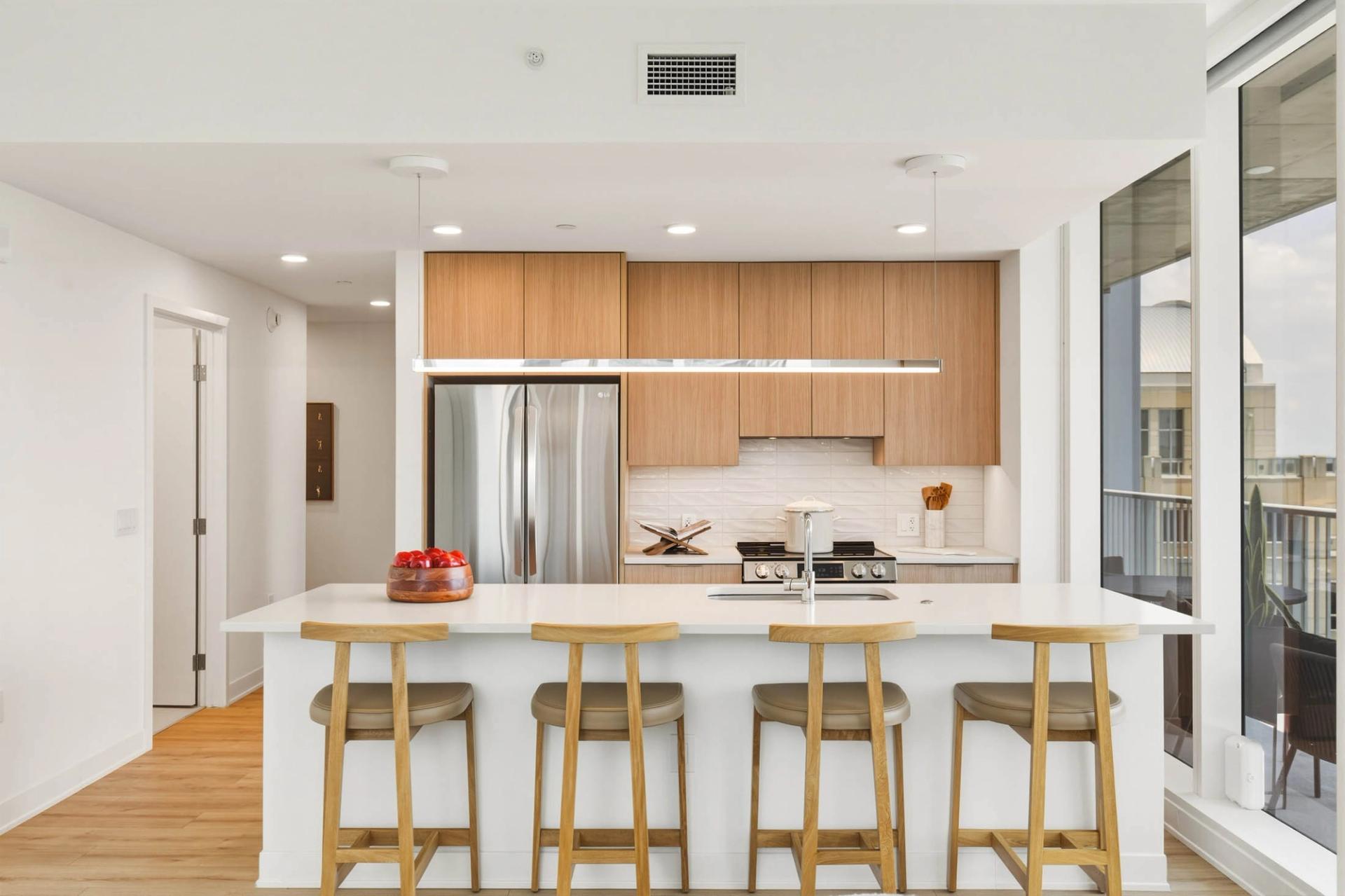 ATX Residences interior photo of an open floorplan living room and kitchen