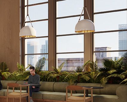 Modern-looking cafe with large windows showcasing a city view.