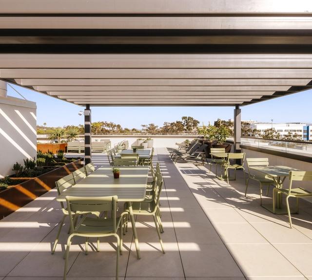 Open air dining spaces create the perfect setting to gather, dine, and take in the California coastline