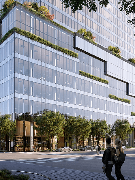 A view of a building exterior with terraces and trees