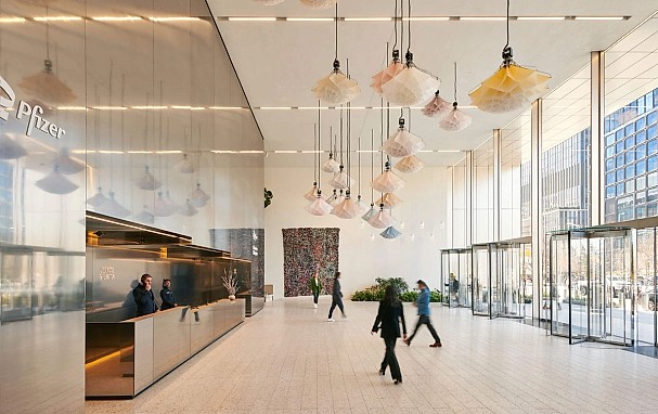 An image of a building lobby with people