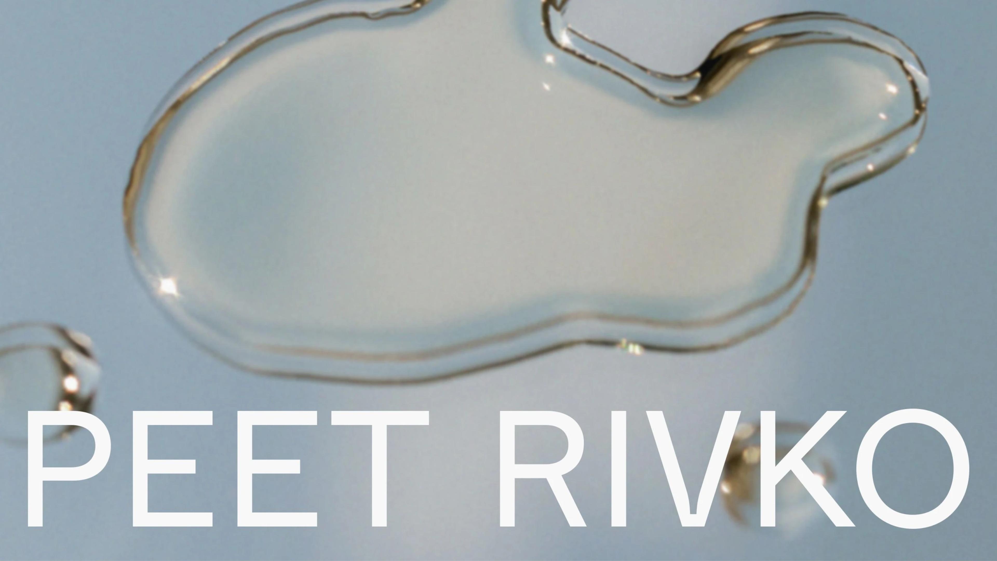 A translucent drop shaped like a cloud on a soft blue background, alongside bold text reading "PEET RIVKO."