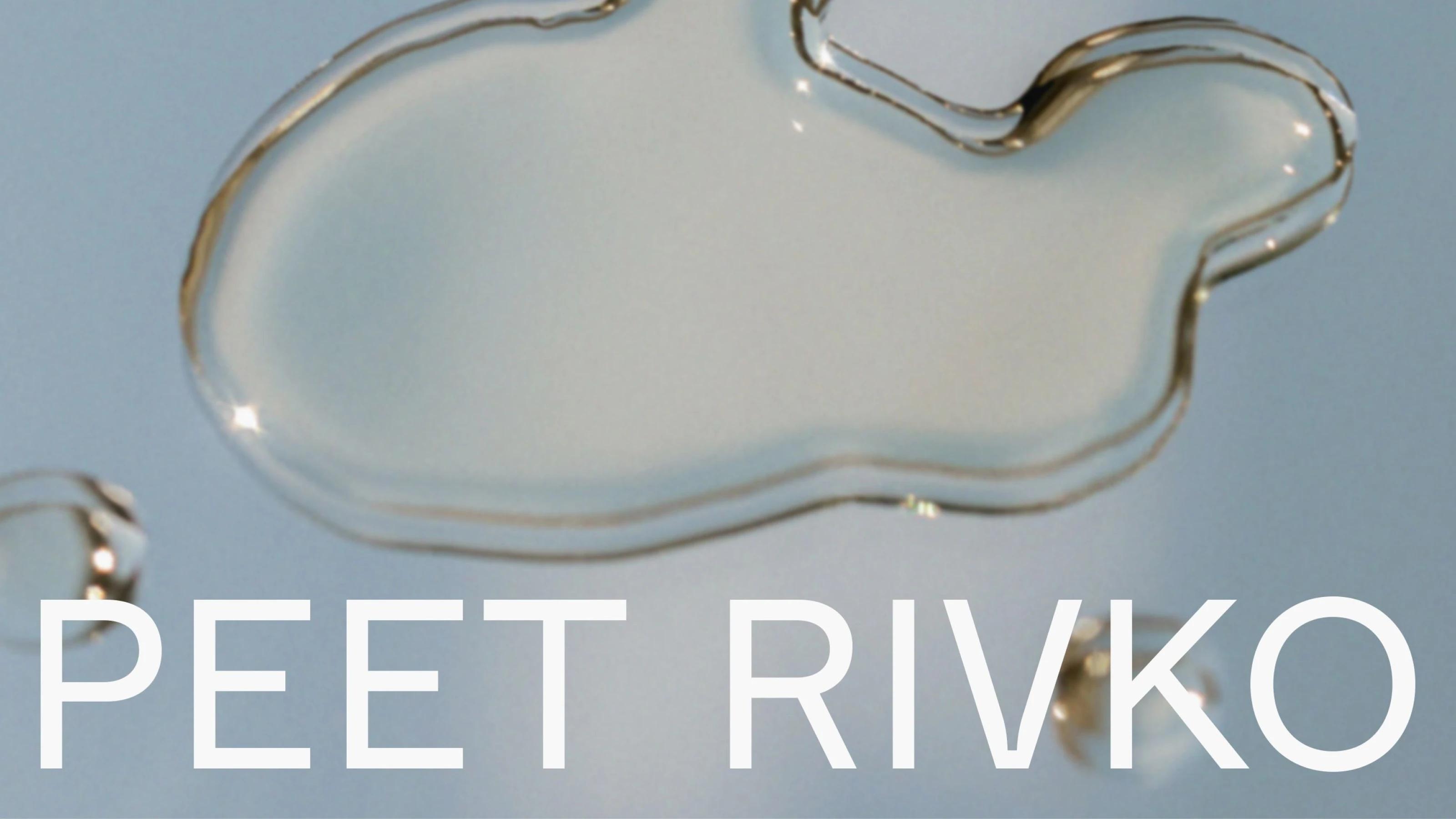 A translucent drop shaped like a cloud on a soft blue background, alongside bold text reading "PEET RIVKO."