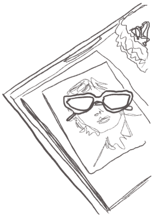 A dark silhouette of a face with prominent features against a contrasting background.