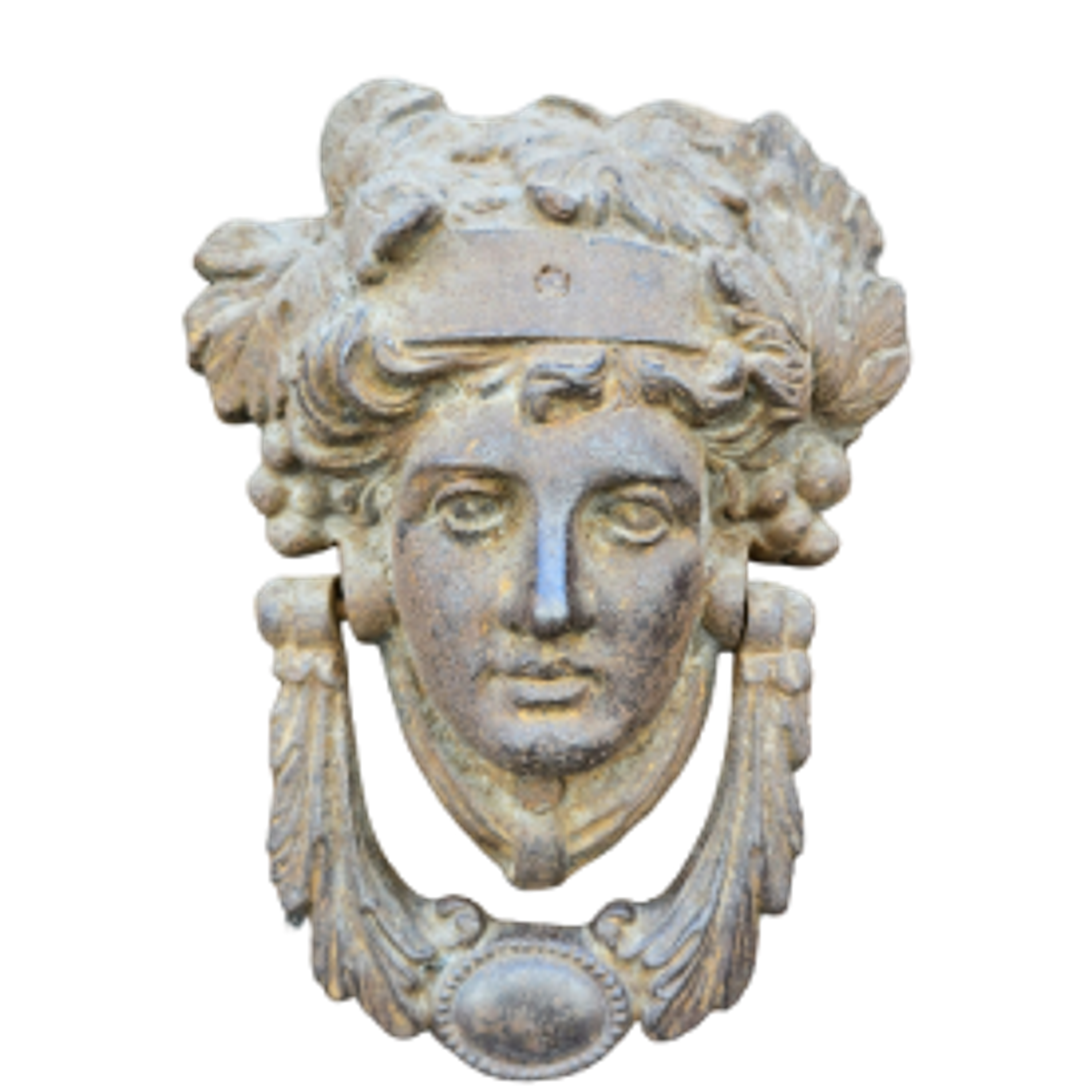Ancient stone relief depicting a female face adorned with a crown and surrounded by decorative foliage.