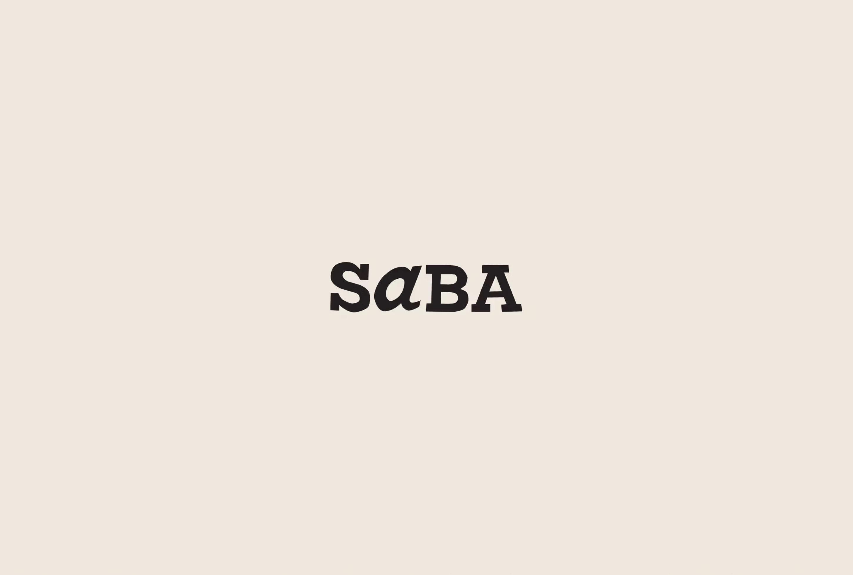 Black text spelling "SABA" on a soft beige background, with the letter 'a' stylized in lowercase.