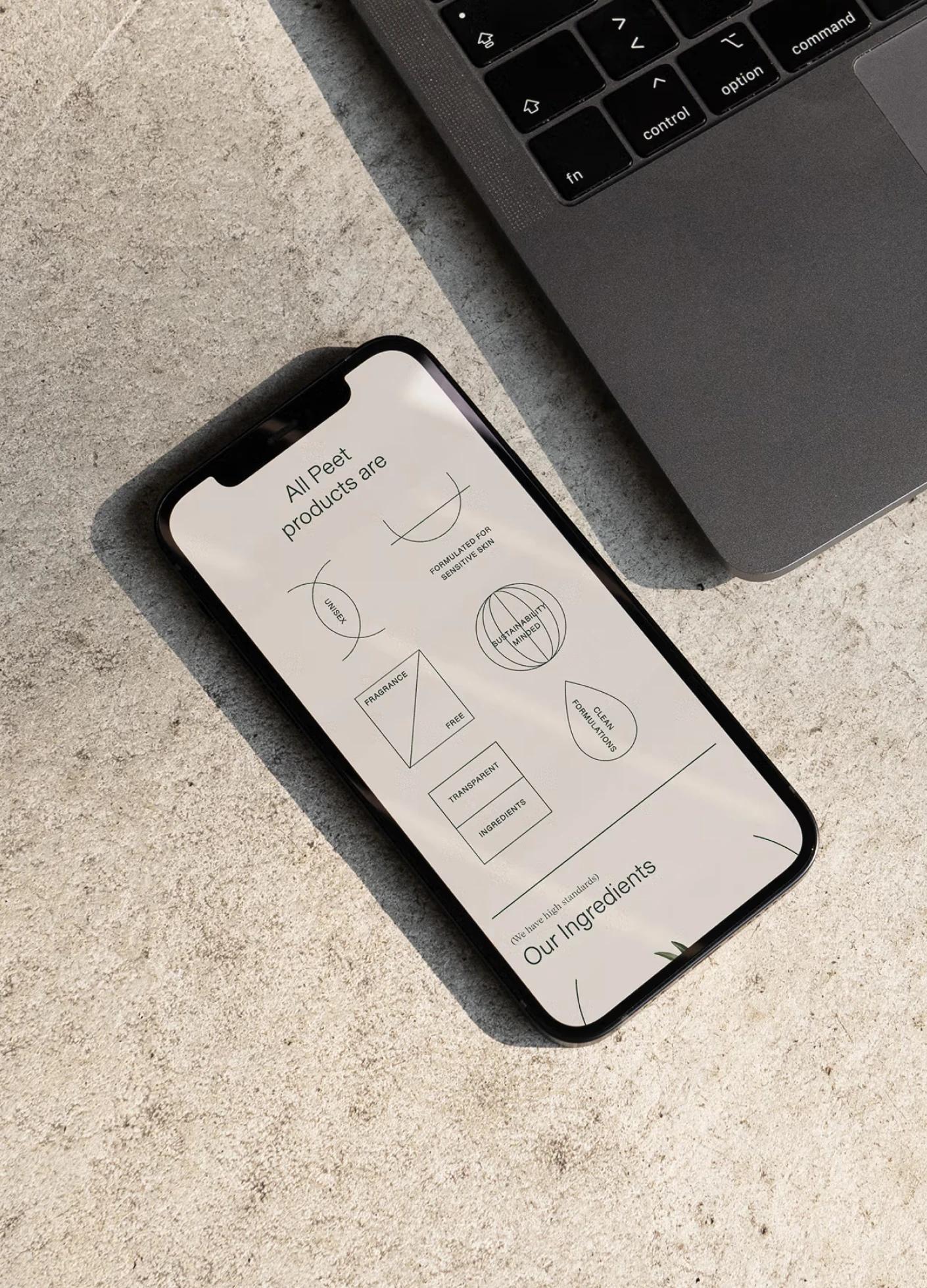 A smartphone displaying a webpage about Peet products, highlighting features like transparency and clean ingredients, on a...