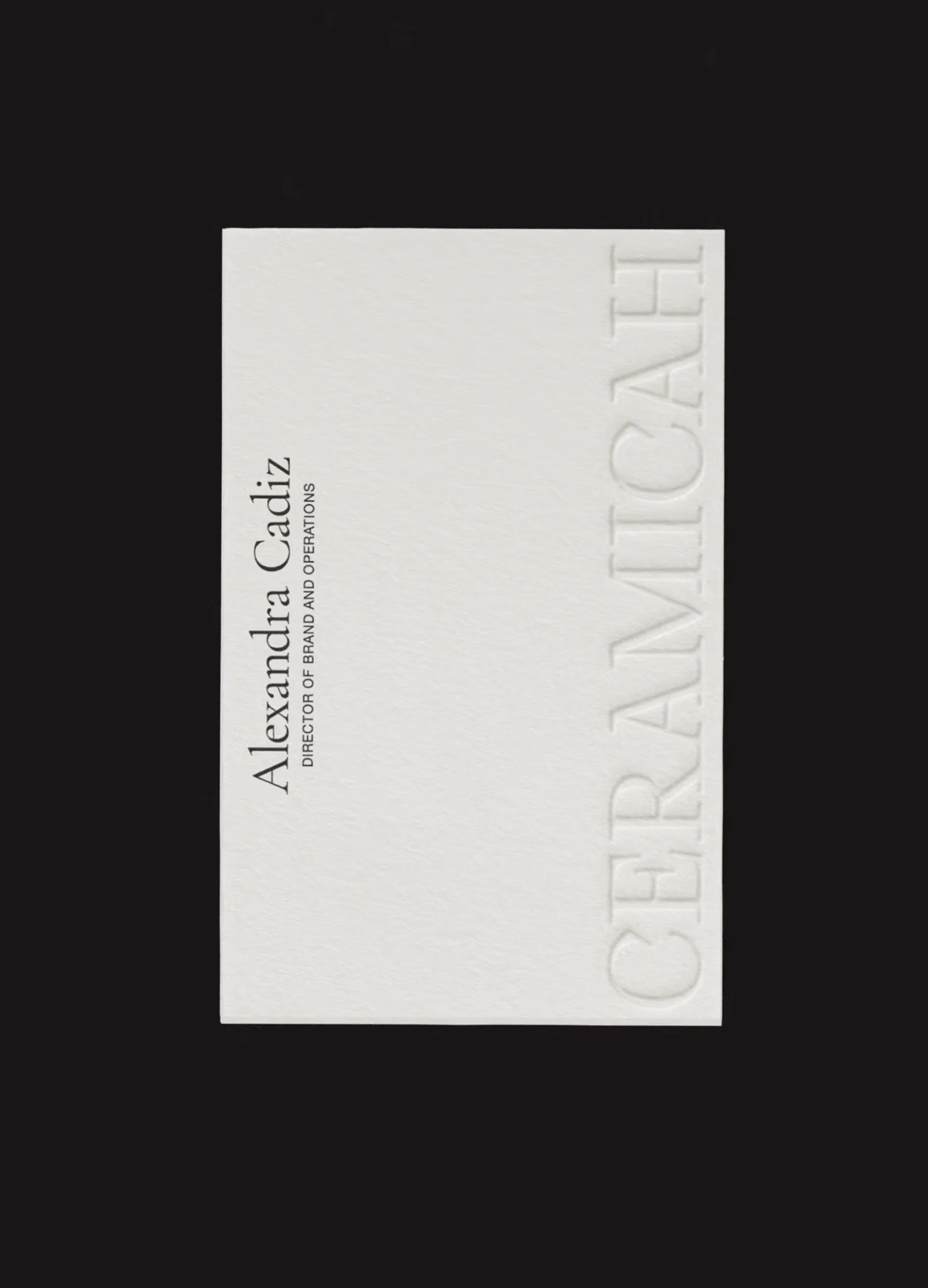 White business card featuring embossed text: "Ceramicah" and "Alexandra Cadiz, Director of Brand and Operations."