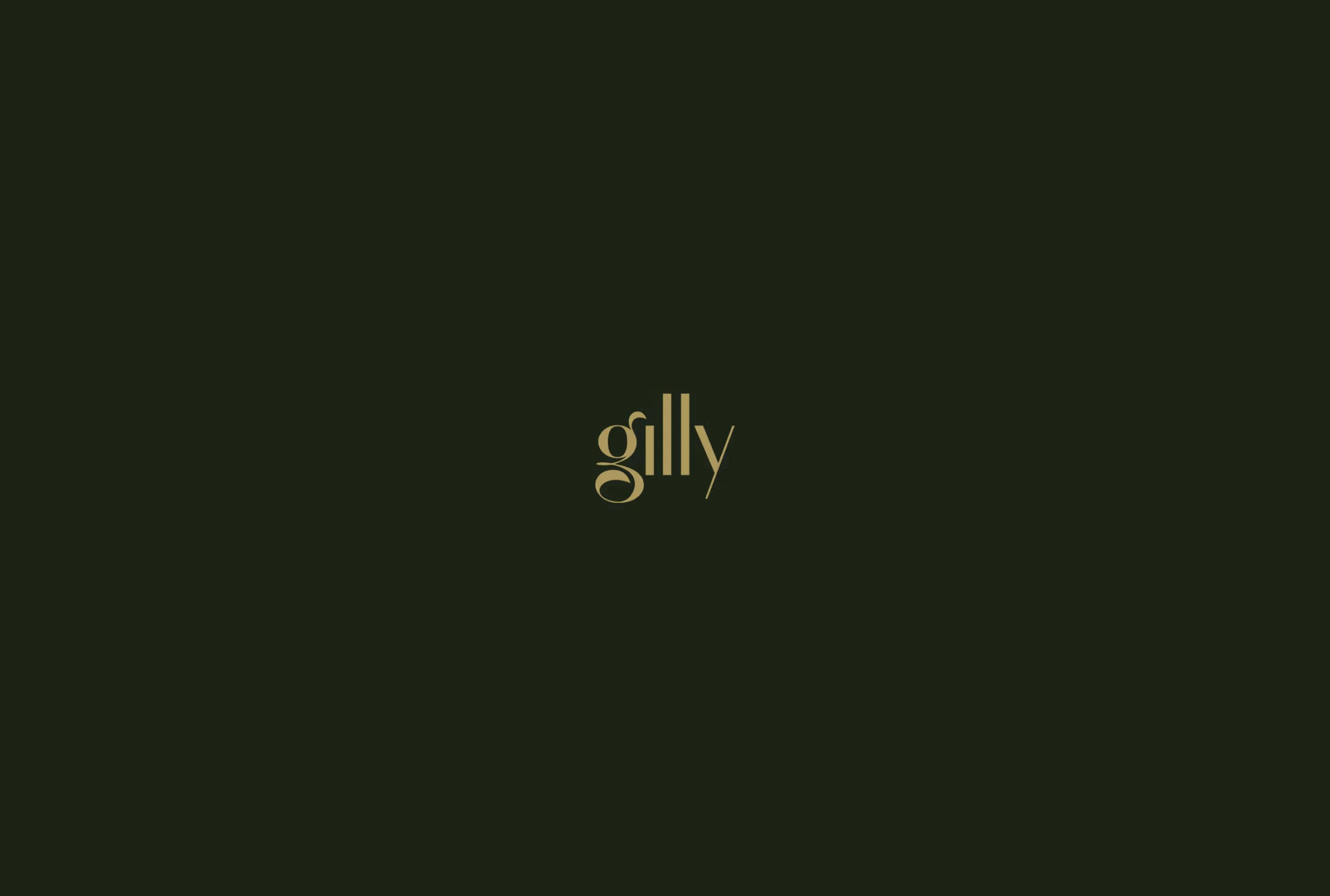 Elegant gold text spelling "gilly" centered on a dark green background.