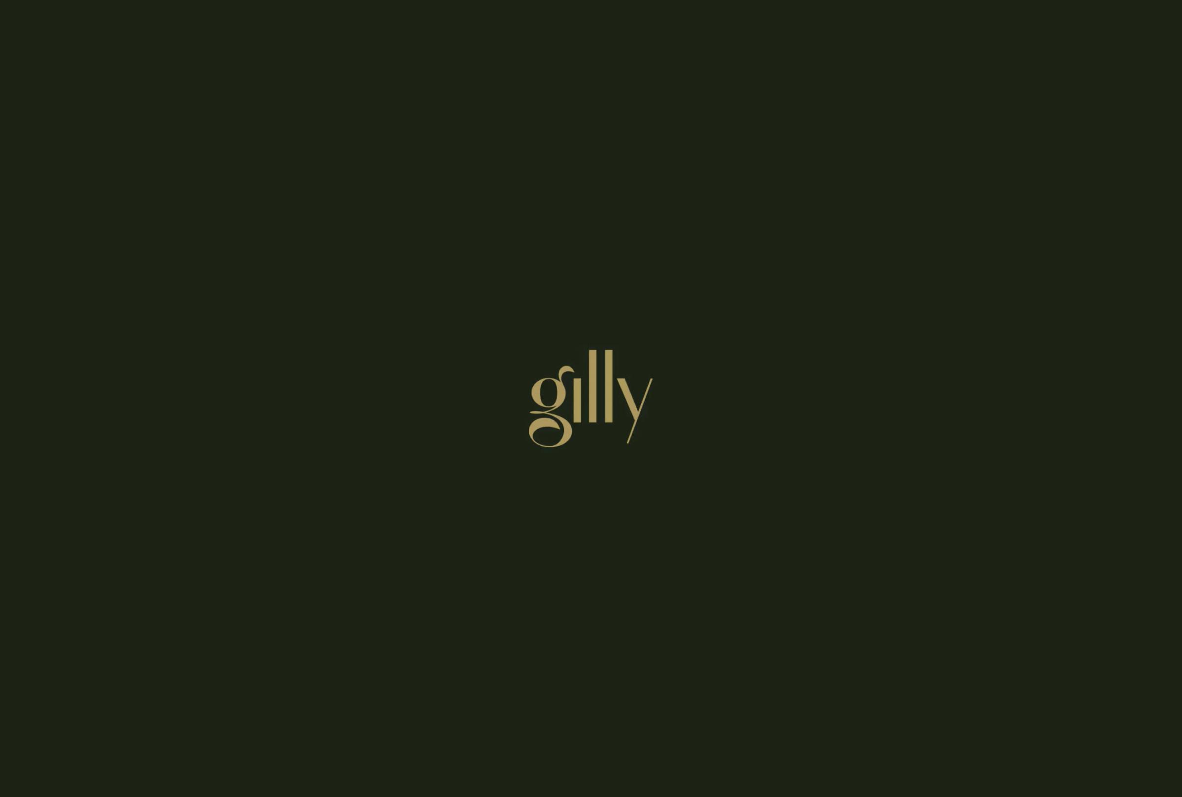 Elegant gold text spelling "gilly" centered on a dark green background.