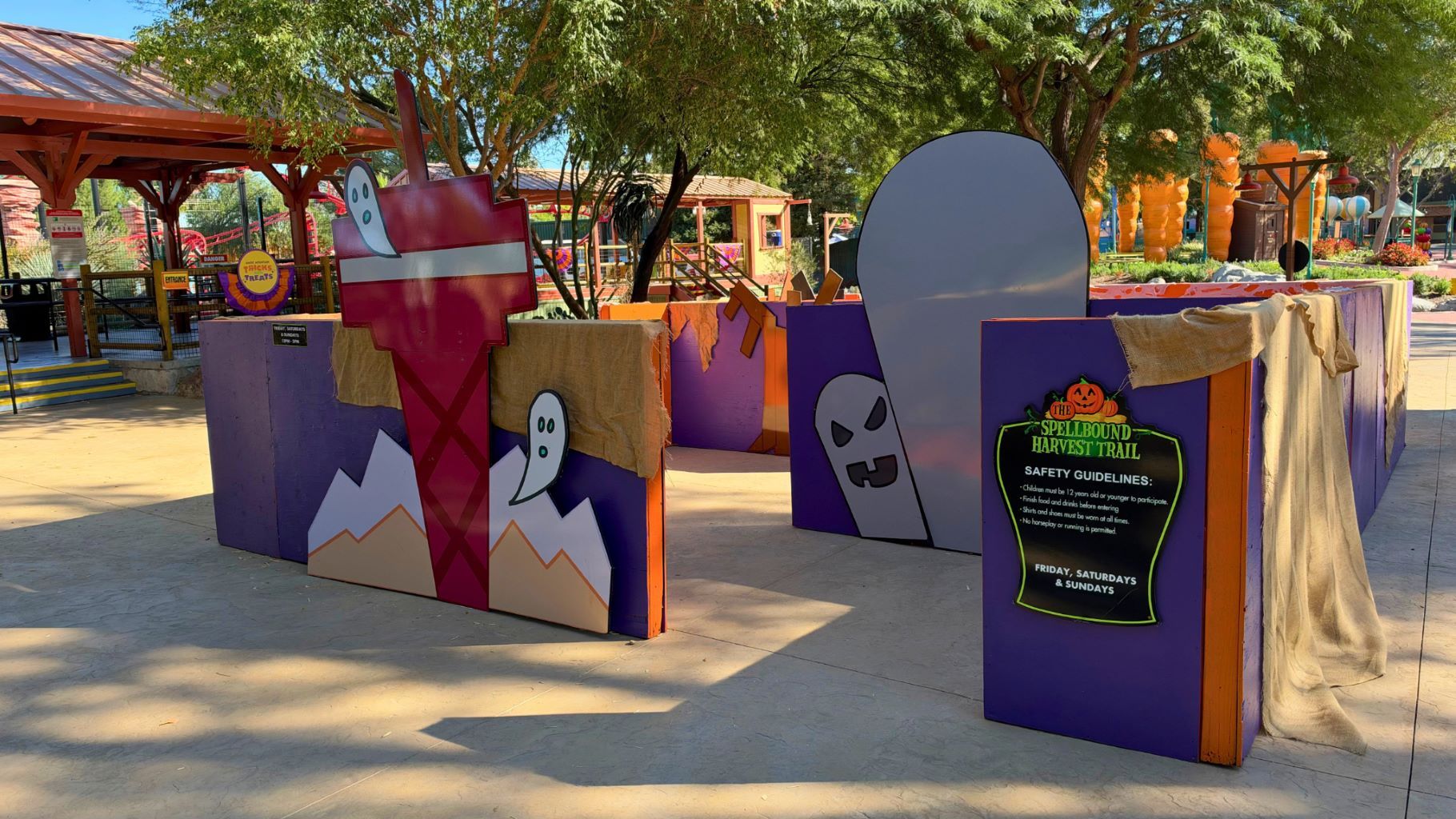 Guests walking through the Tricks and Treats harvest maze at Six Flags Magic Mountain