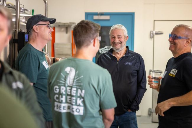 A group of brewers discuss the makings of Reader's Choice West Coast IPA.