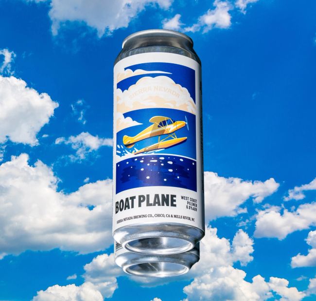 A Sierra Nevada Boat Plane can hovering in the clouds.