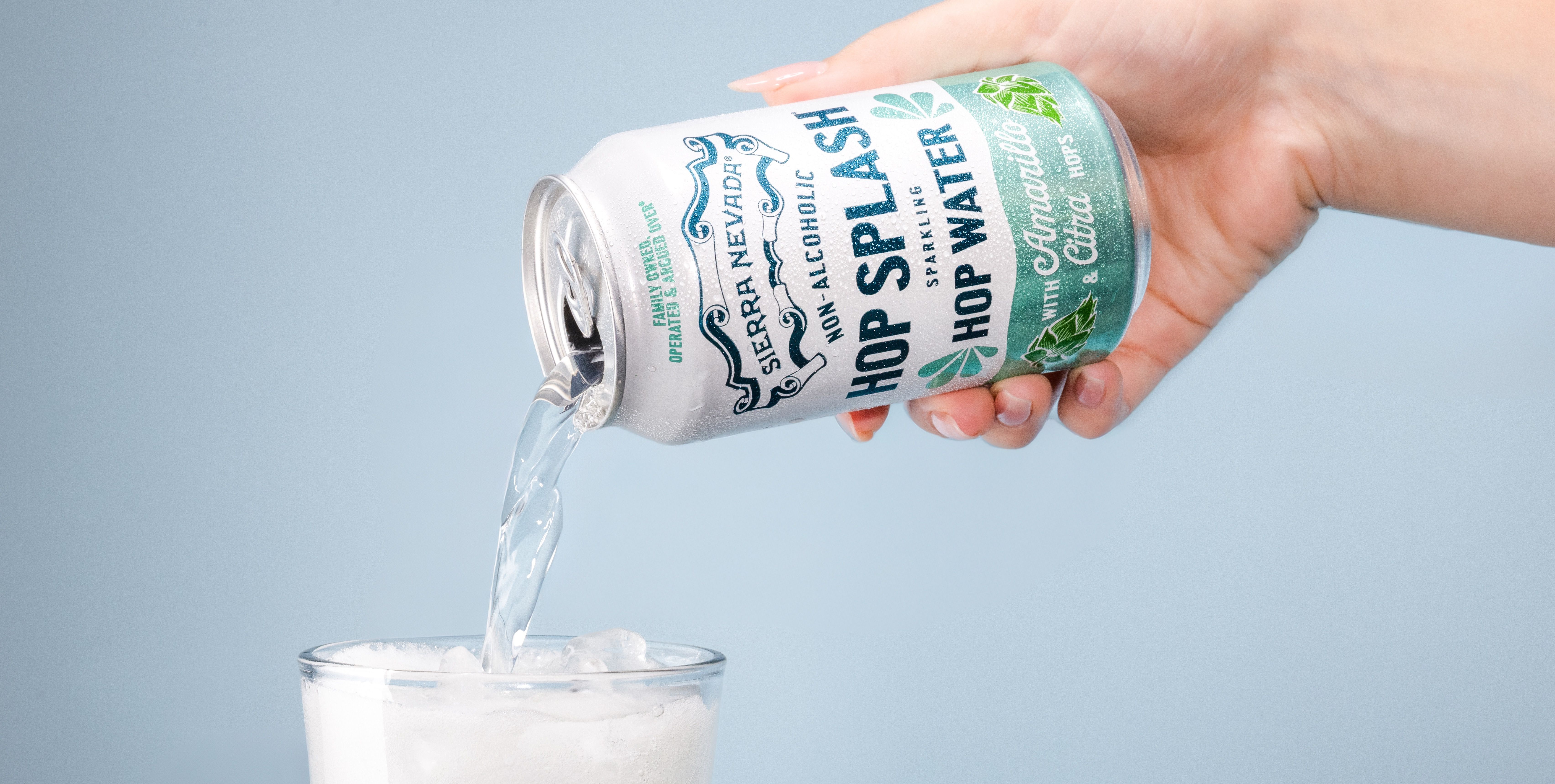 Sierra Nevada Hop Splash hop water pouring from the can into a glass