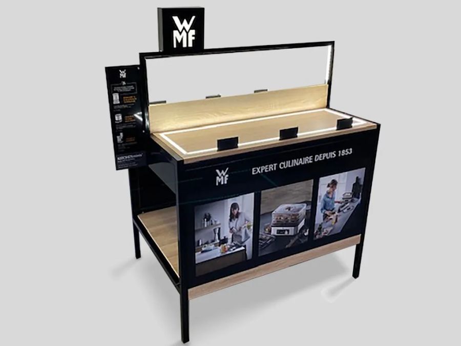 Lit WMF kitchenware display table