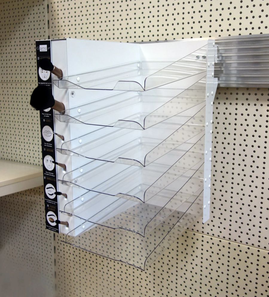 Makeup brush wall display with sample brushes