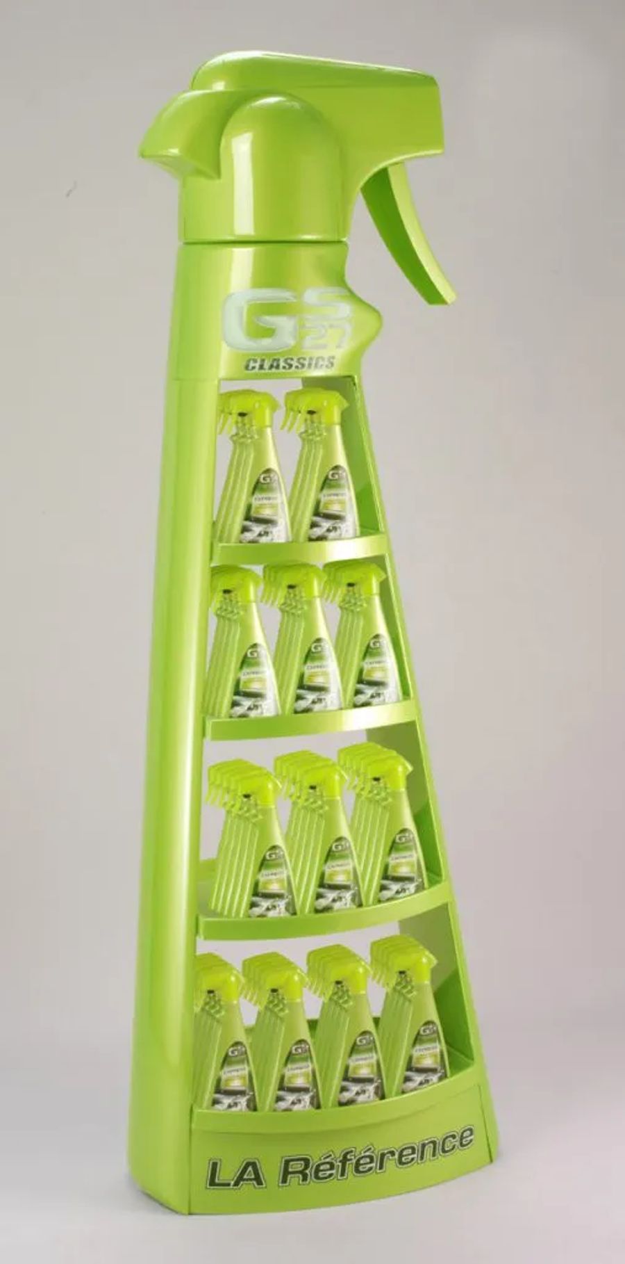 Green spray-bottle shaped floor display