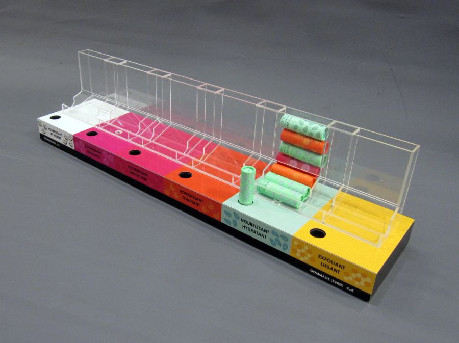 Color-coded acrylic lip balm shelf tray