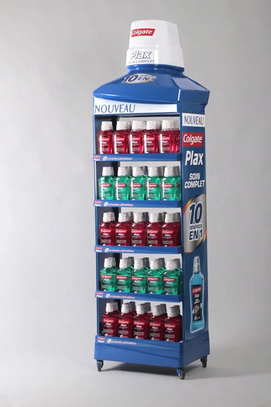 Blue Colgate Plax bottle-shaped stand