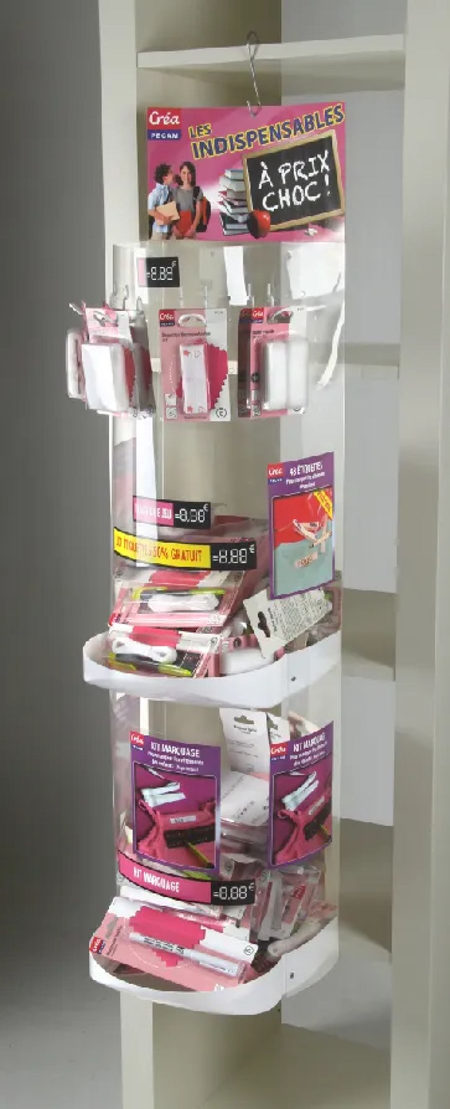 Hanging craft supplies display with pink header