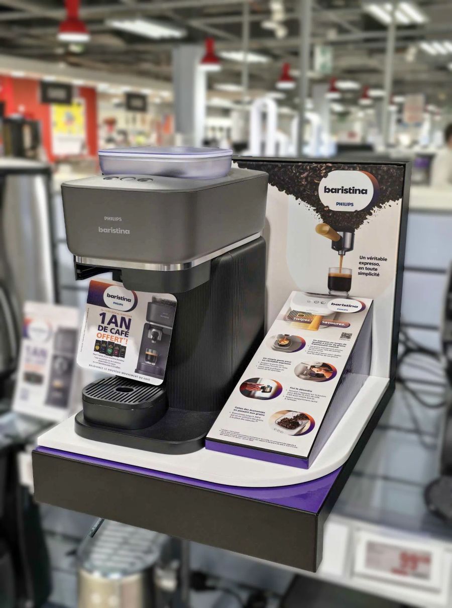 Philips Baristina espresso machine on counter display