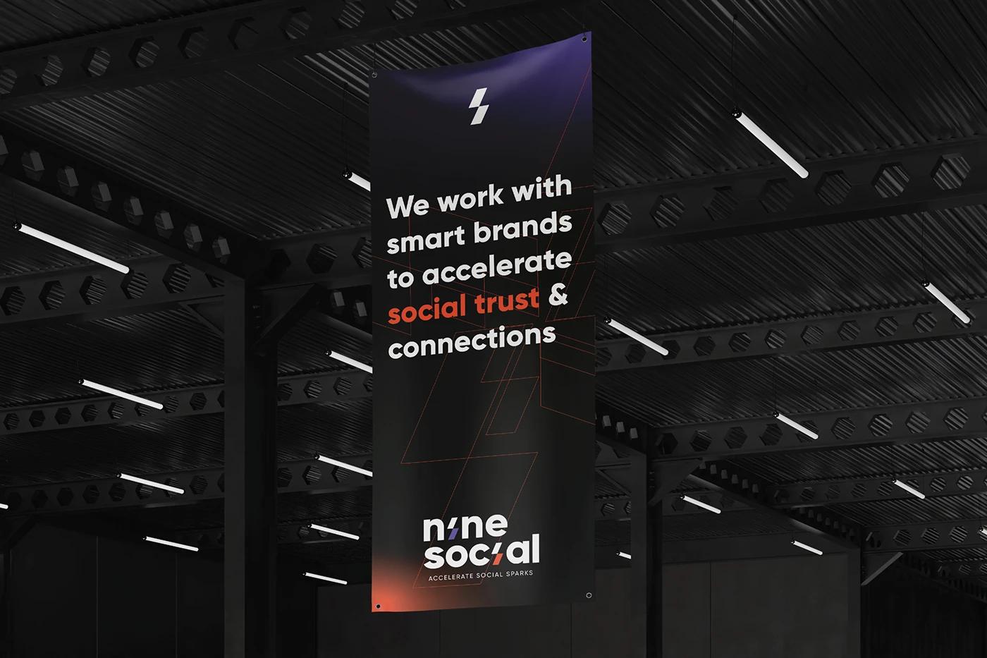 A Ceiling Banner with Branded Messaging of Nine Social created, designed by SOLD Studio ensuring consistent brand application.