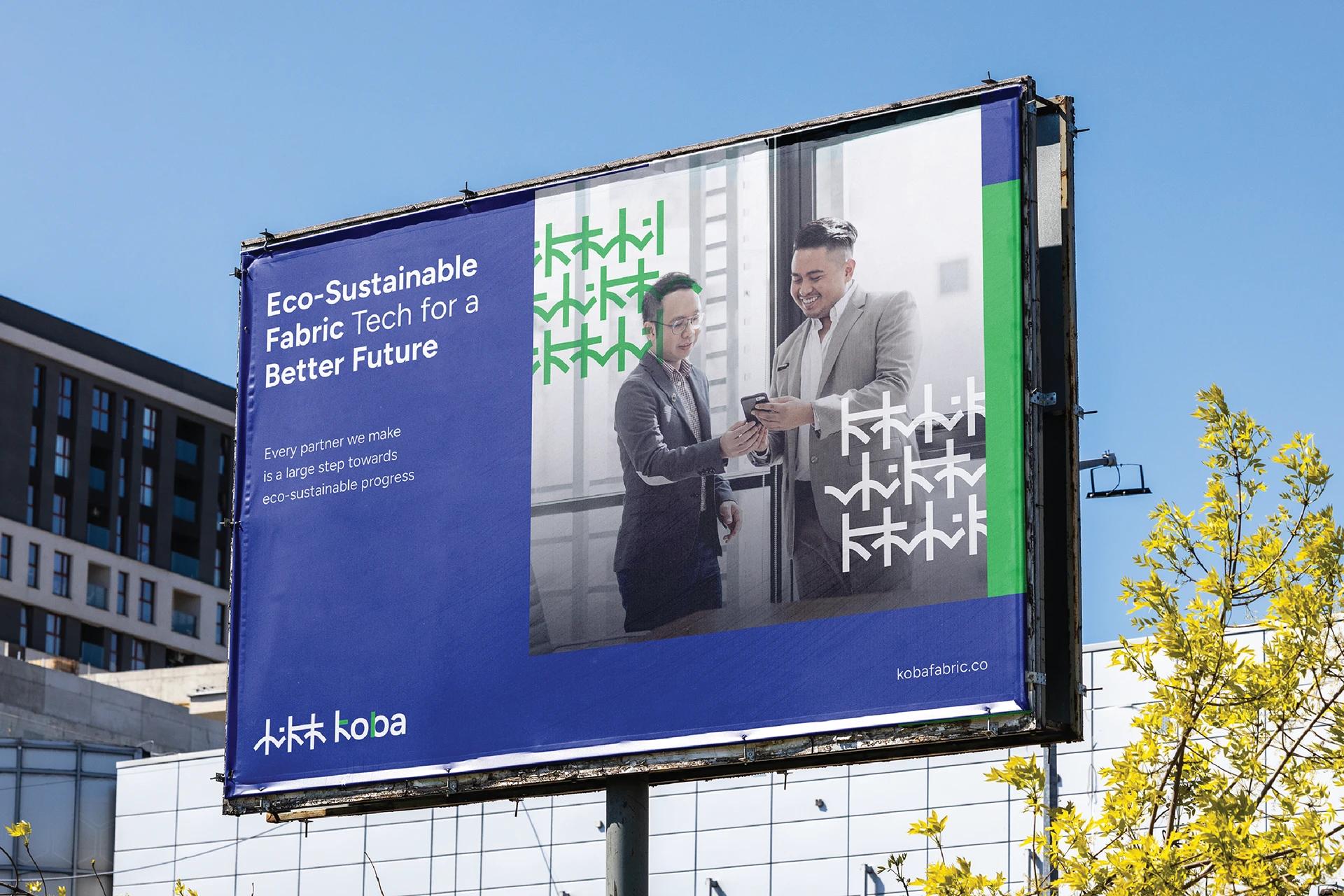 A OOH Large-format outdoor billboard advertisement of the KOBA project, designed by SOLD Studio capturing high-traffic audience attention.