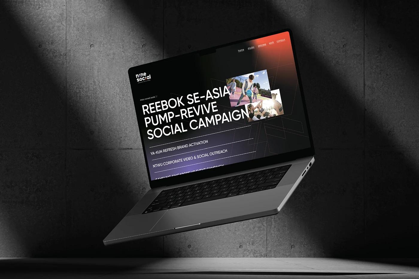 A Macbook laptop showcasing website High-fidelity UI/UX design design of Nine Social created, designed by SOLD Studio for seamless user experience.