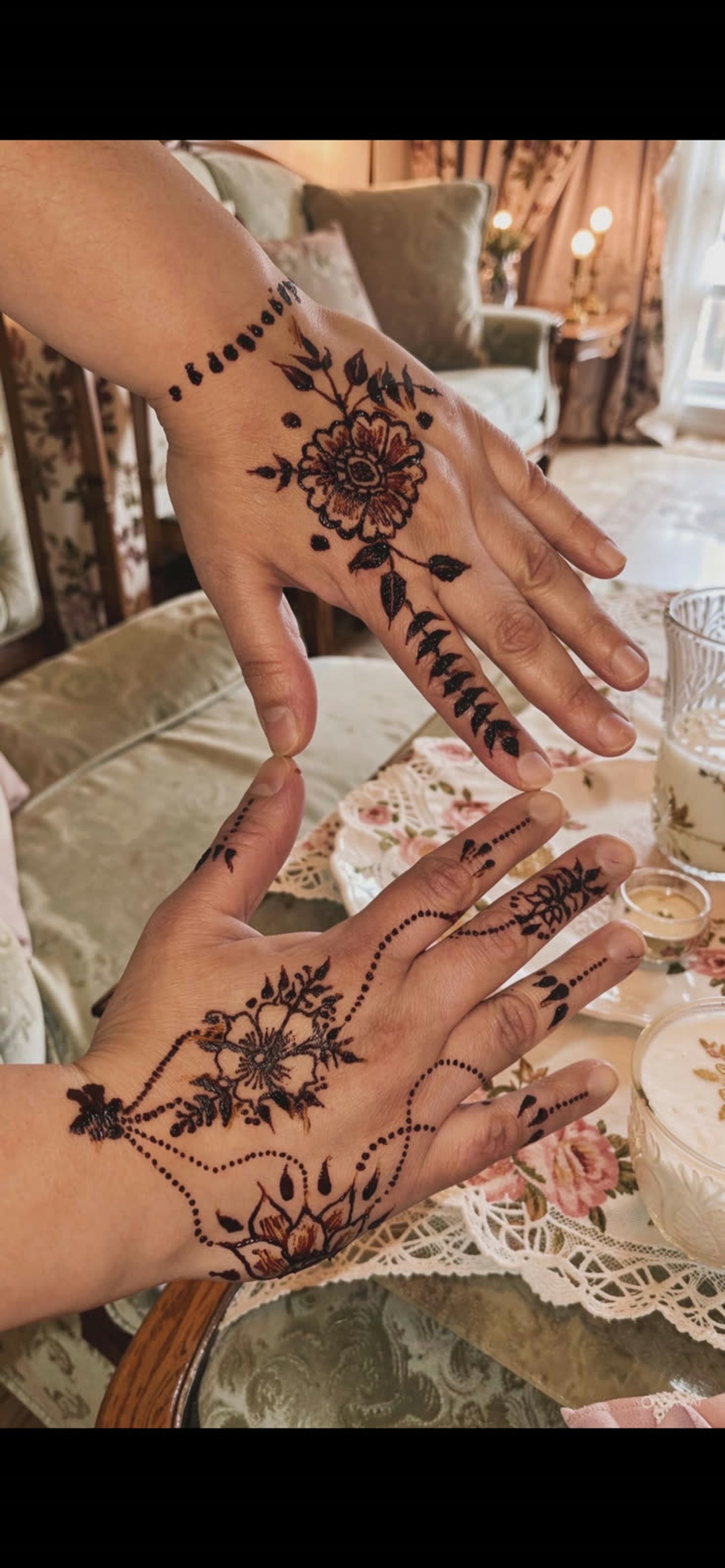 Detailed henna design on the hand