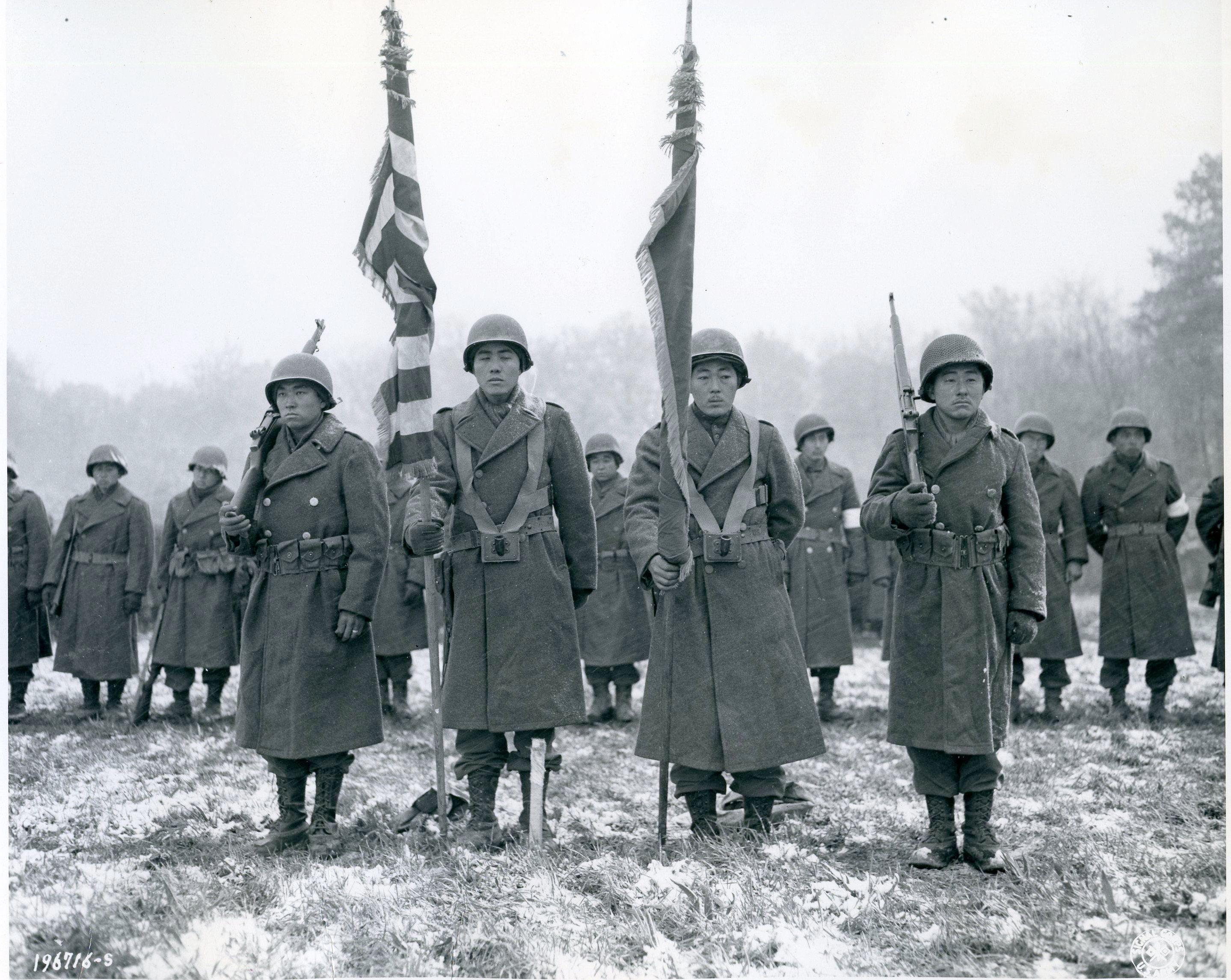Historic photo of 442nd regiment Color Guard. 