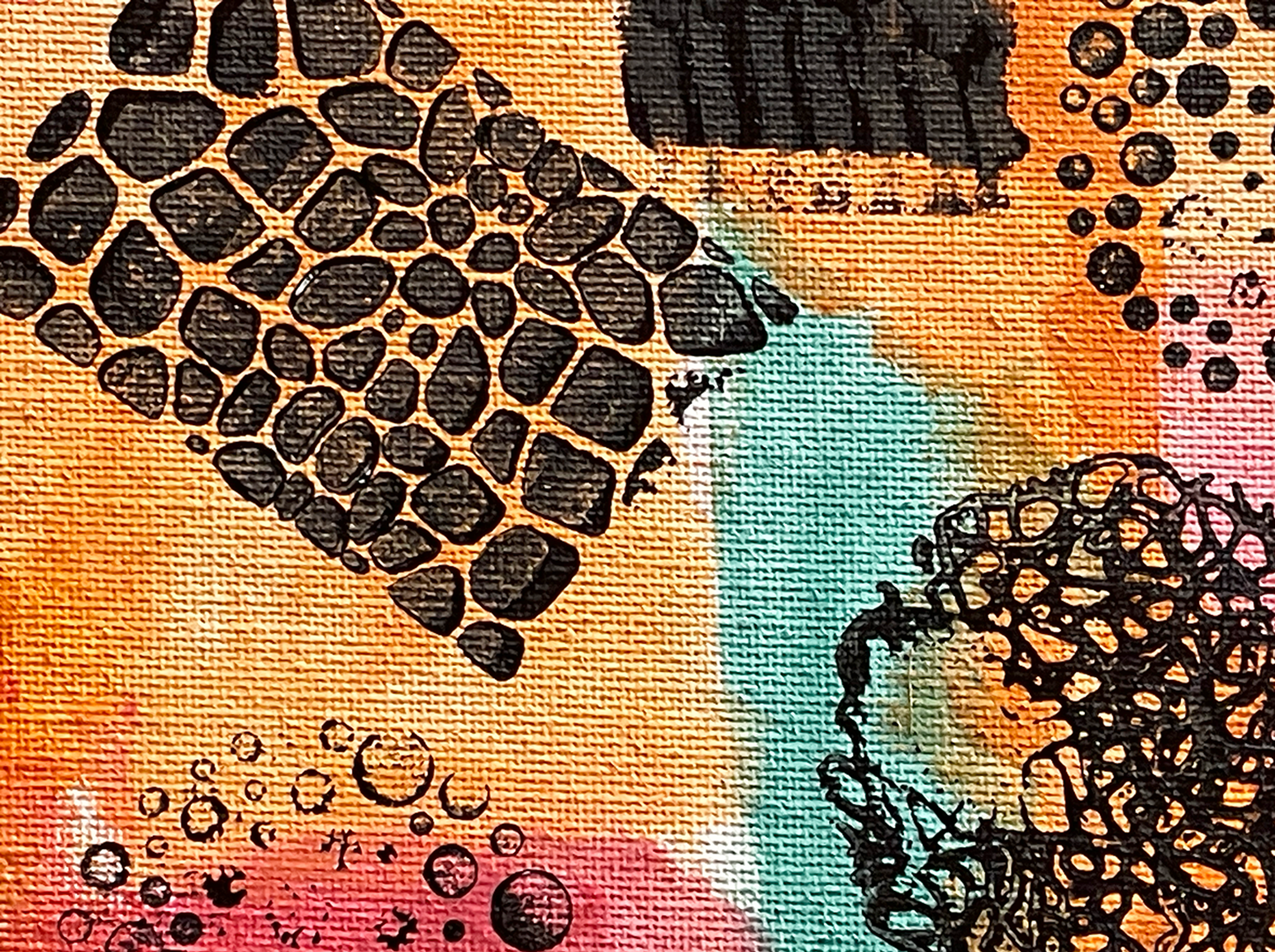 Detail from a painting done with splashes of watercolor in shades of orange, pink, turquoise, and red with patterns stamped over it in black.