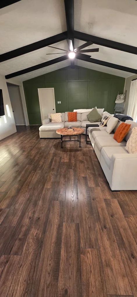 Family room floors cleaned and furniture tidied