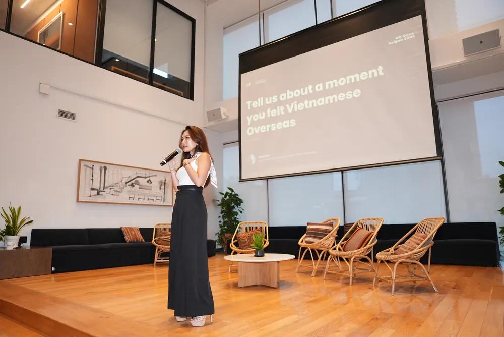 A member sharing her story on stage