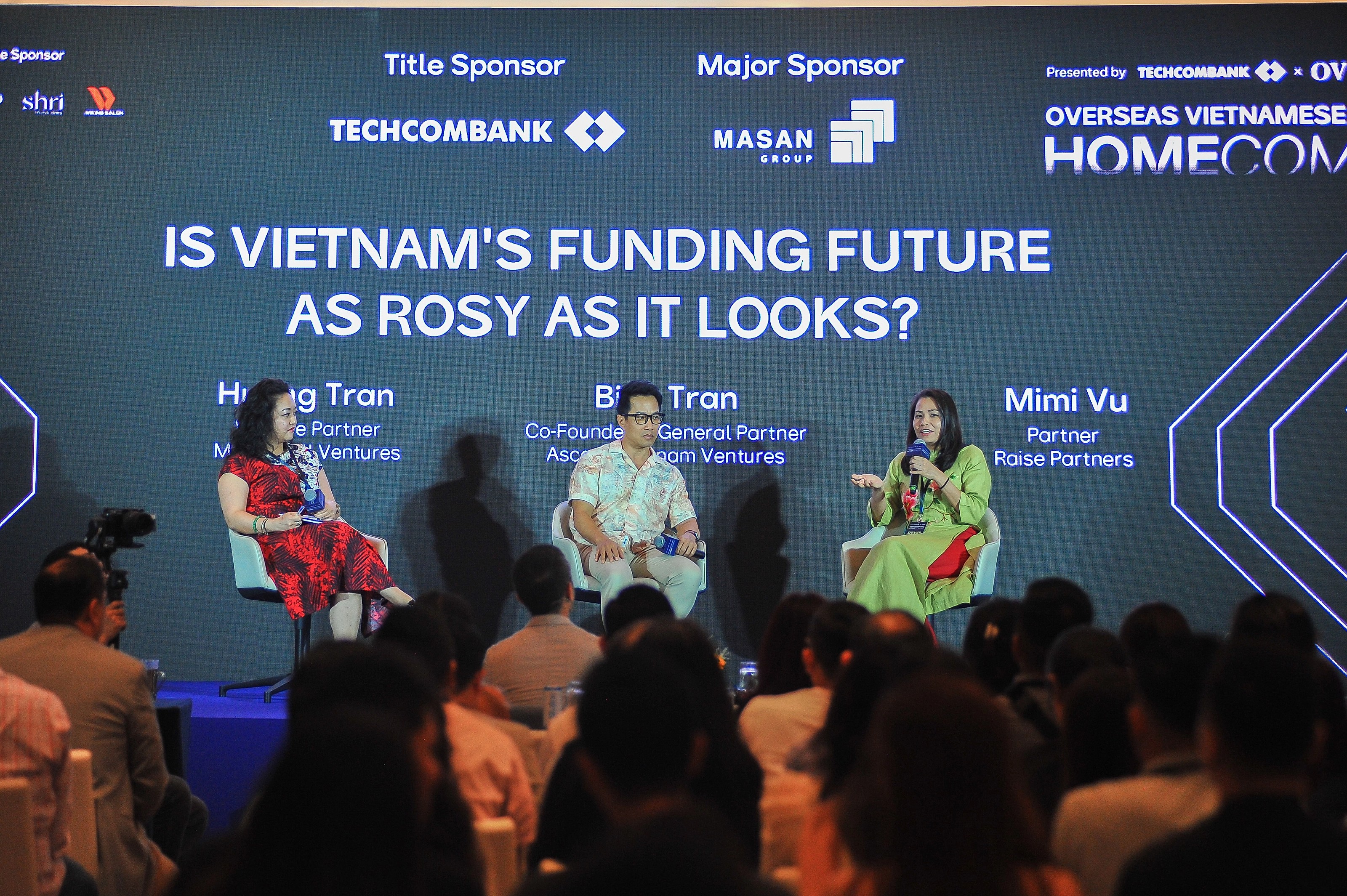 A member sharing her story on stage