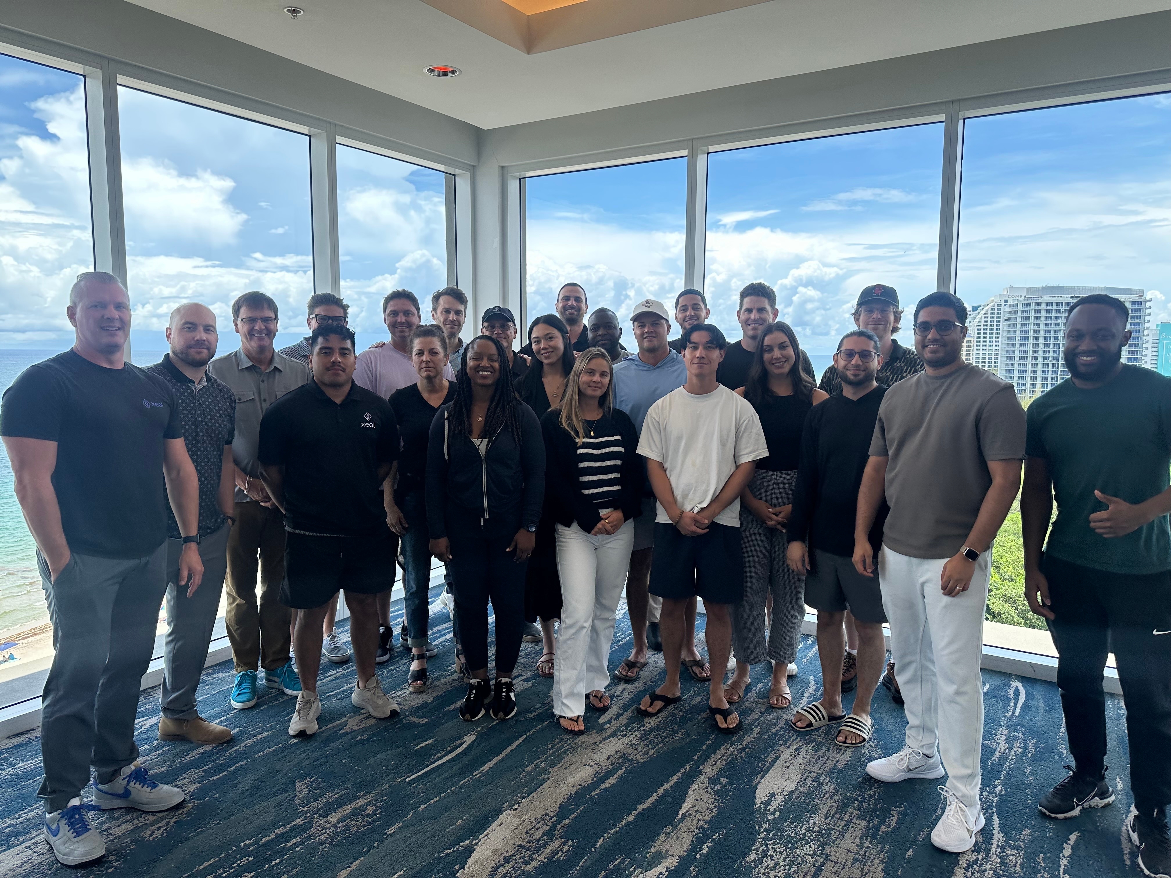 xeal team in meeting room with window
