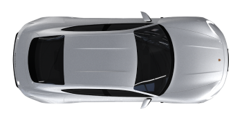 an aerial view of a silver porsche on a black background