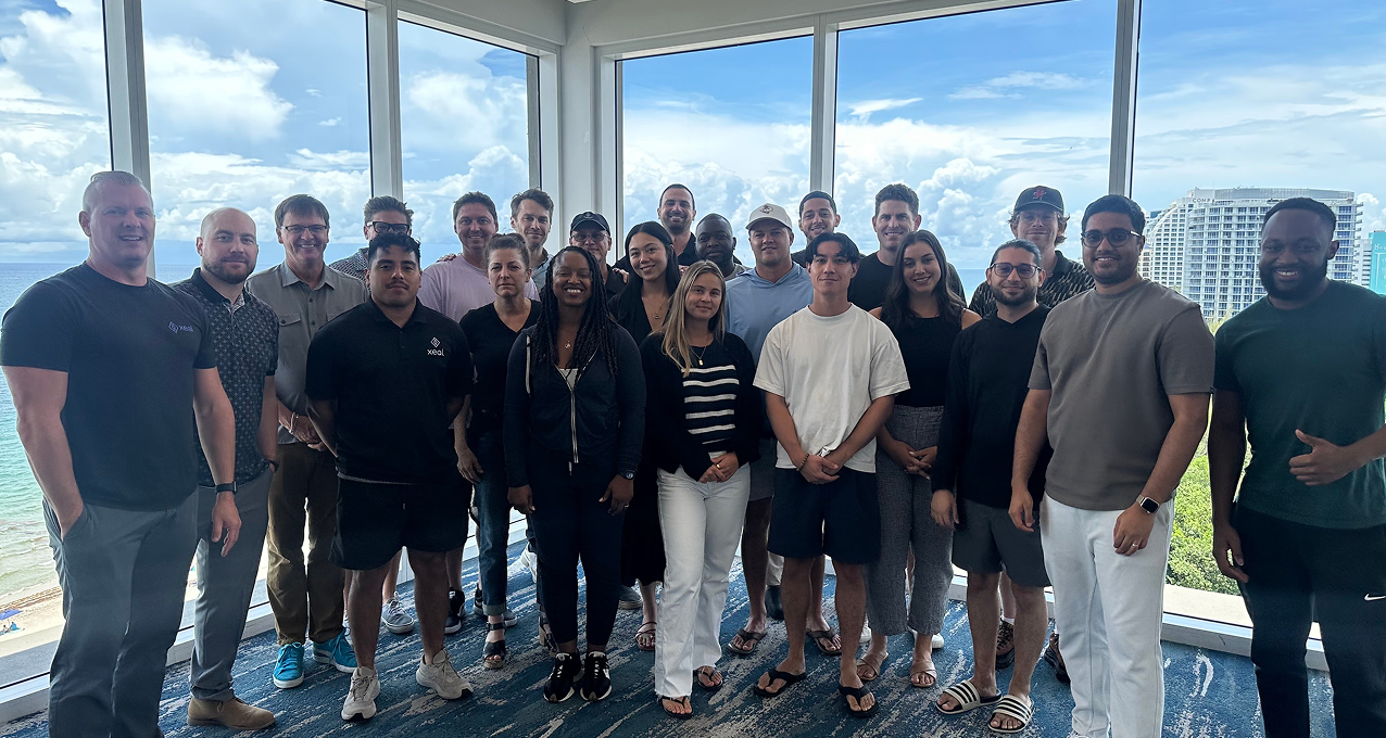 xeal team in meeting room with window