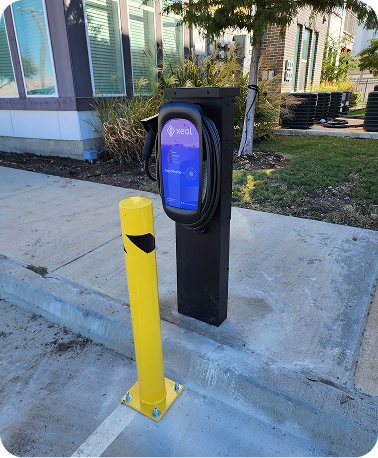 Xeal Charger on side walk