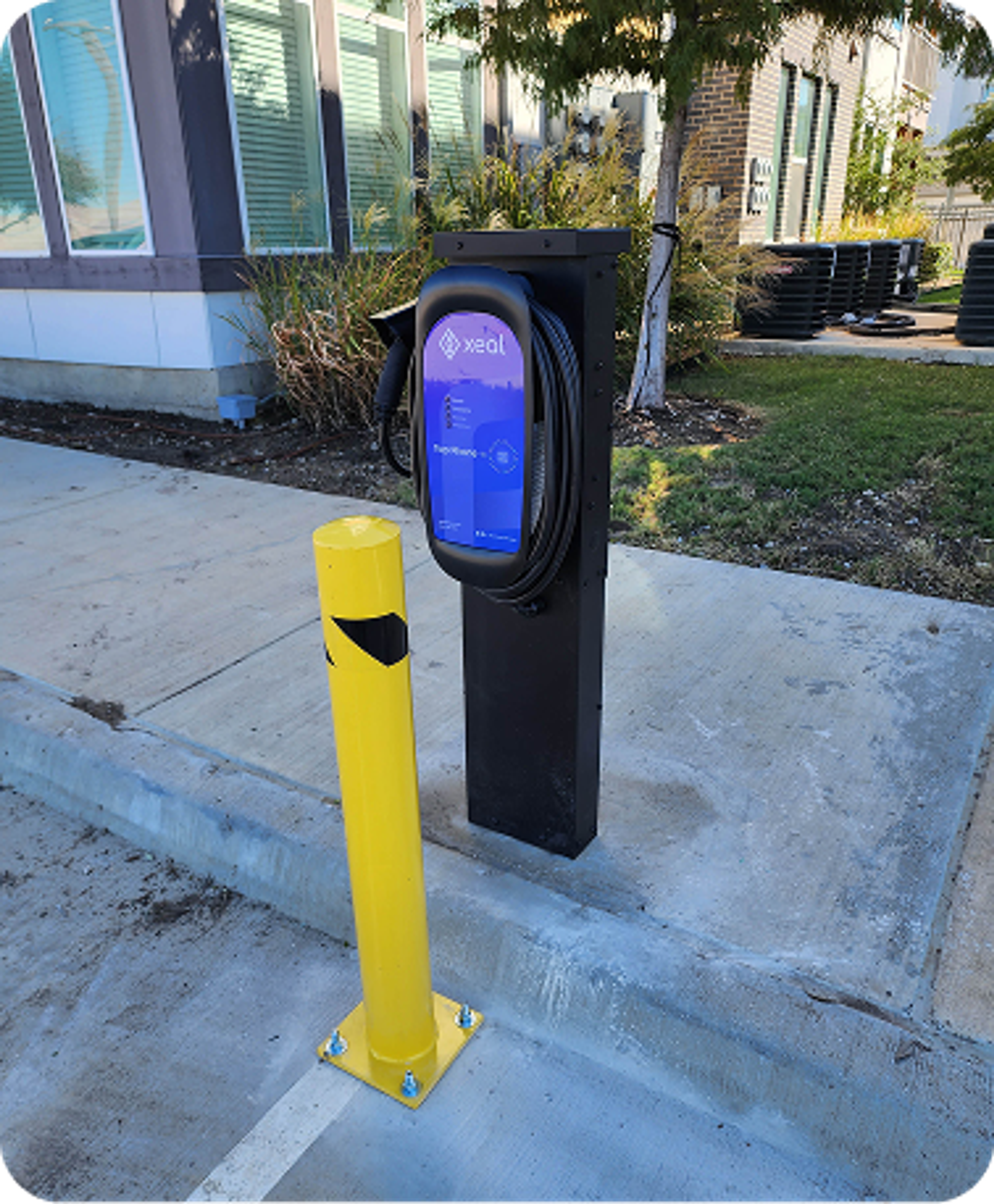 Xeal Charger on side walk