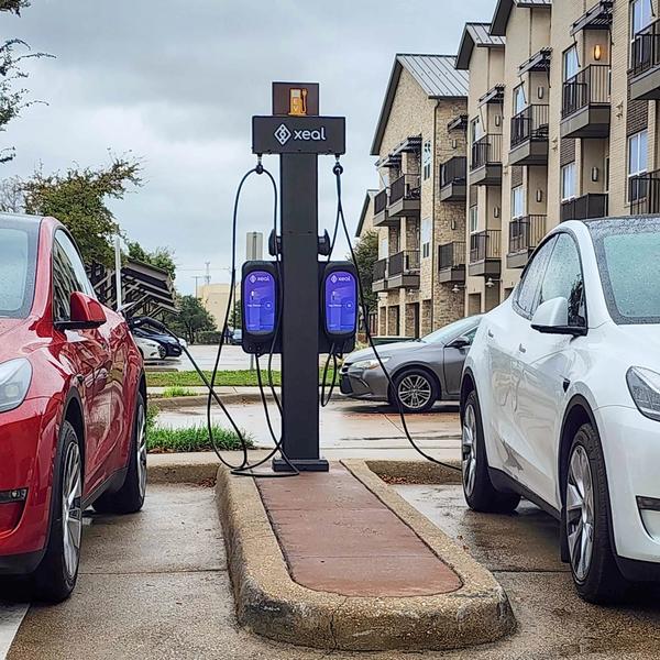 Xeal charger between 2 cars