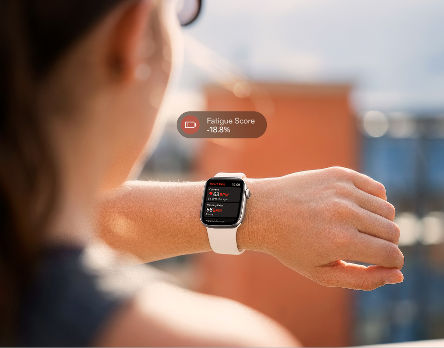 Woman_looking_at_watch_fatigue_data_overlay