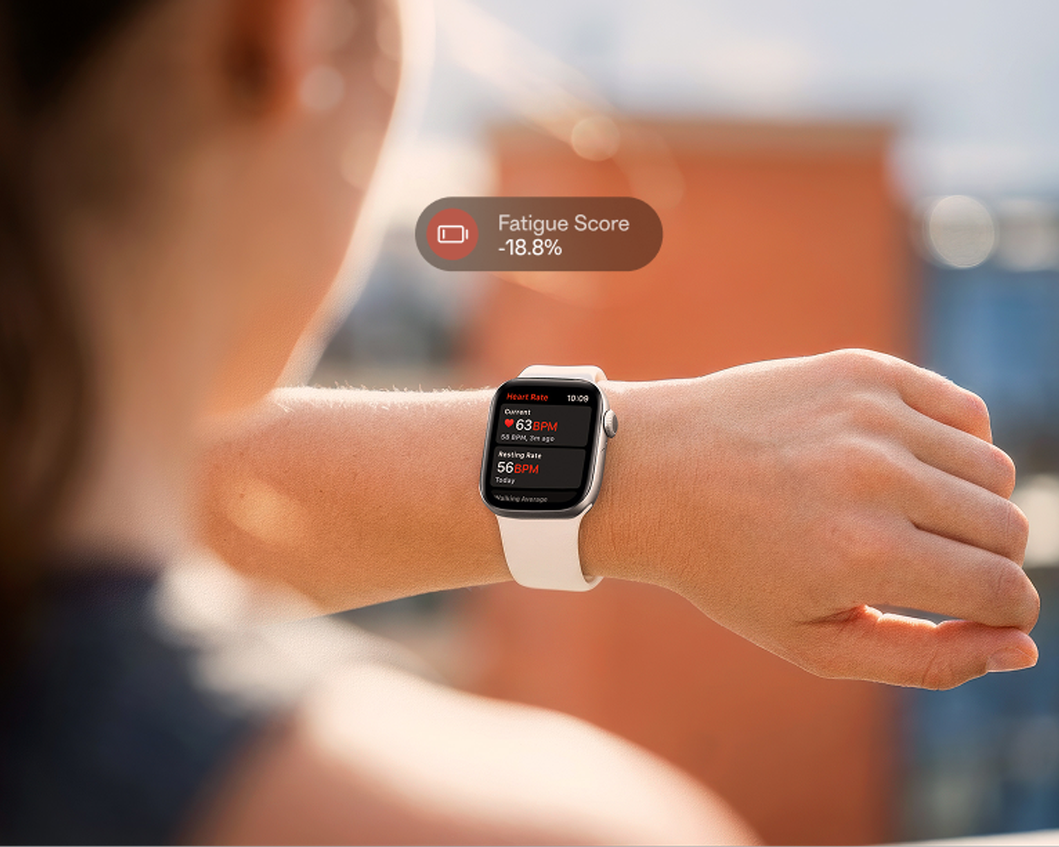 Woman_looking_at_watch_fatigue_data_overlay