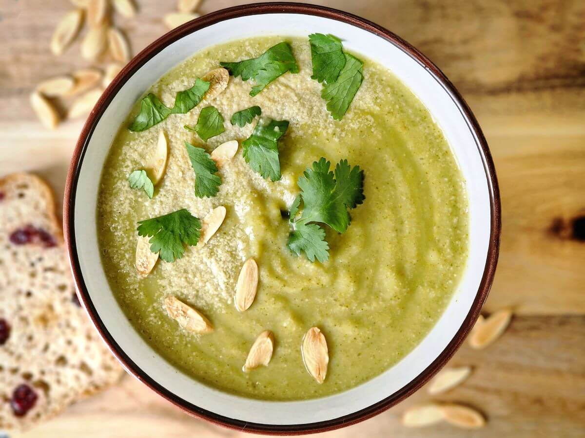 Broccoli almond soup in a bowl.