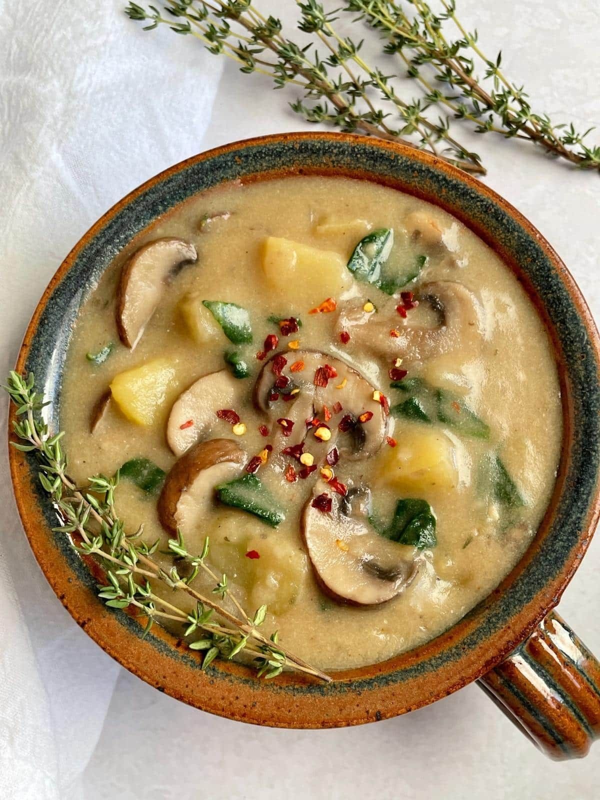 A bowl of vegan potato mushroom soup.